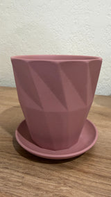 Faceted pink ceramic cactus and succulent pot with a matching saucer